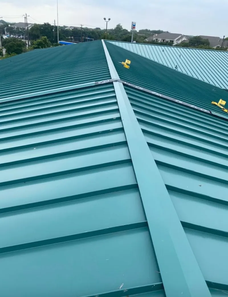 Green commercial metal roof ridge and valley for Metal Roof Repair in Belle Plaine
