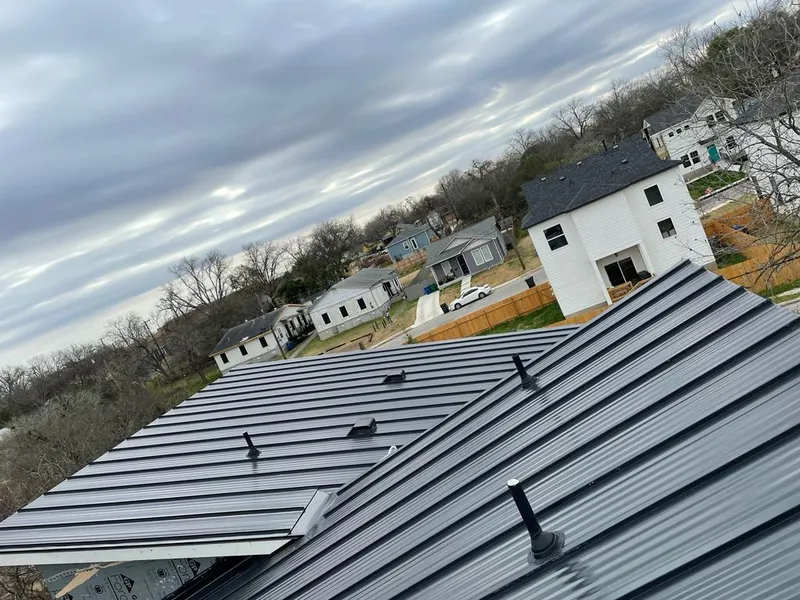 Standing seam metal roof panels with vents for Skylight Repair in Belle Plaine